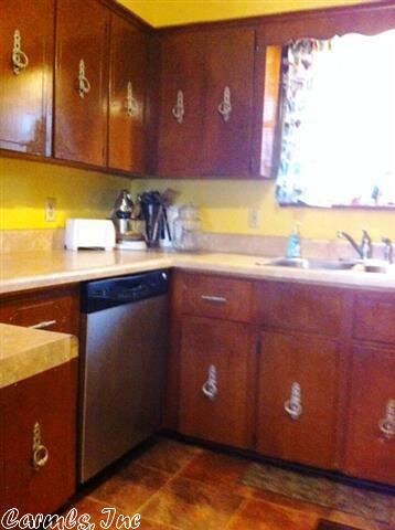 Kitchen has Stainless Dishwasher+tons of cabinets!