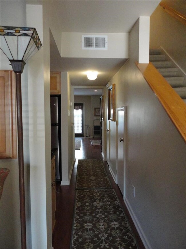 The entry has a lovely flex room just to the left!