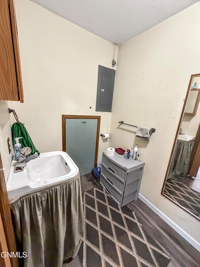 Partial restroom in laundry