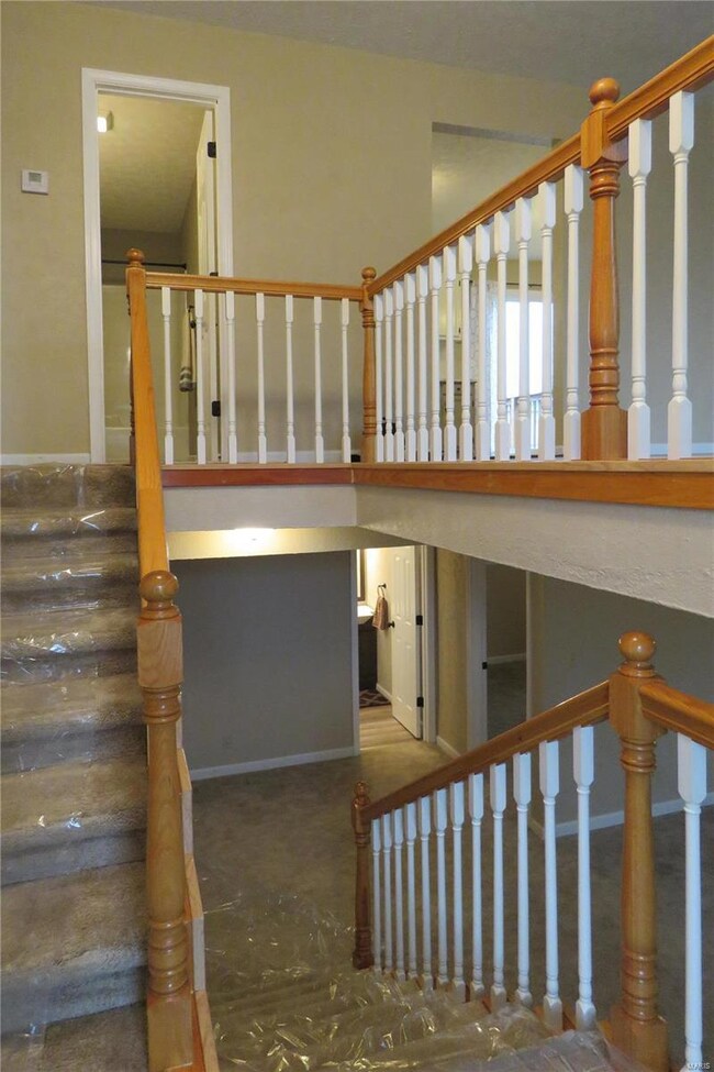 The spacious entryway provides an open concept to 