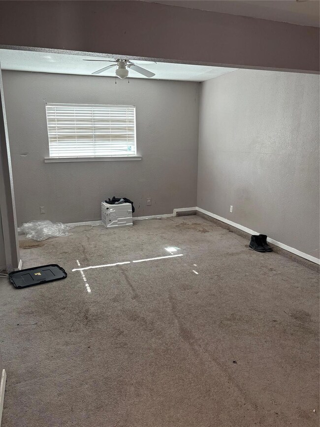 Unfurnished room with ceiling fan