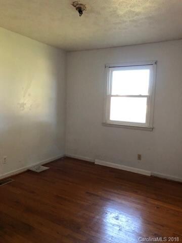 Bedroom, hardwoods.