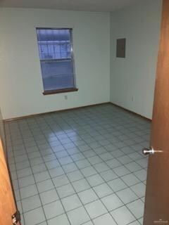 View of tiled empty room