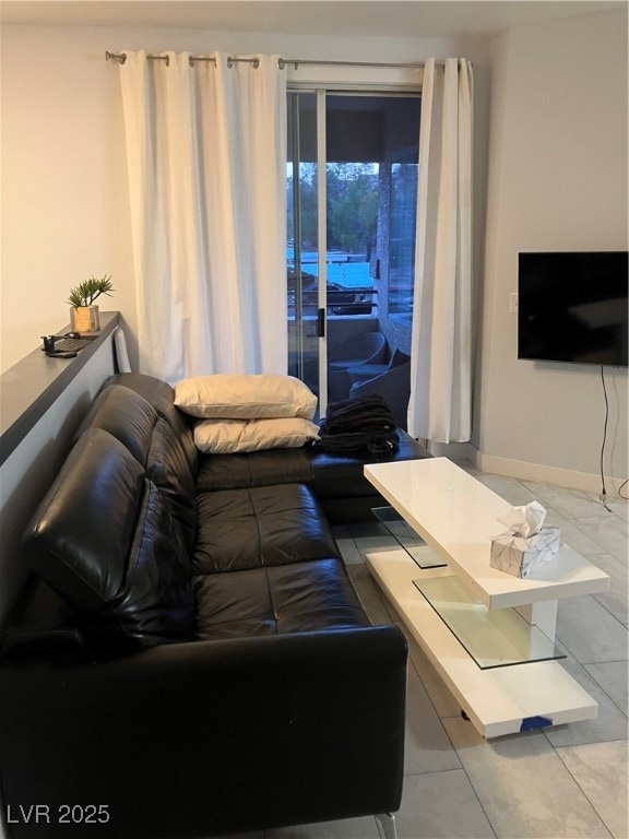 Living room with tile patterned floors