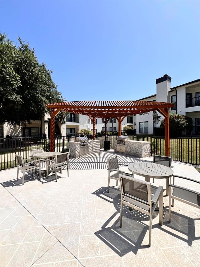 View of patio / terrace featuring a pergola
