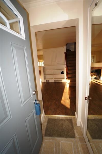 Come on in...powder room on left...coat closet on 