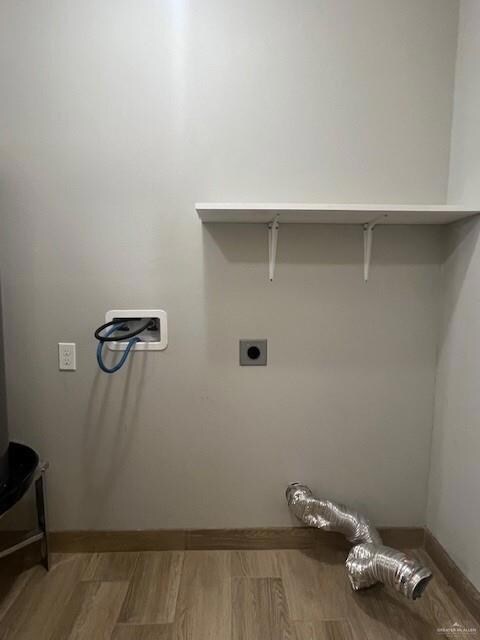 Laundry area featuring hookup for an electric dryer, wood finished floors, and hookup for a washing machine