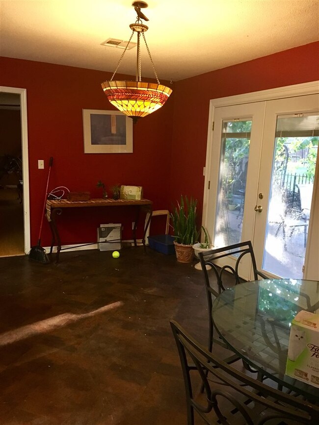 This is such a large space! Doors lead onto back p