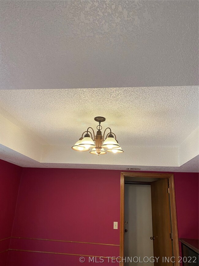 Recessed ceiling in formal dining.