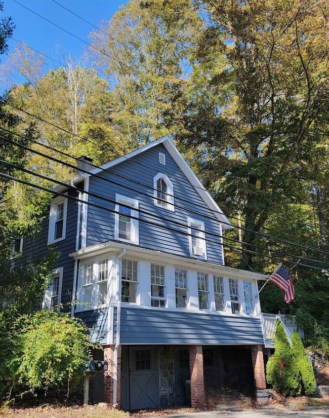 One unit per level with separate entrances and full basement at ground level.