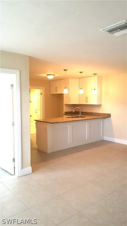 Awesome open concept great room - kitchen has snack bar too.