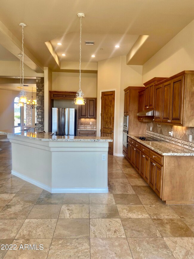 Granite, upgraded cabinets, pendant ligh