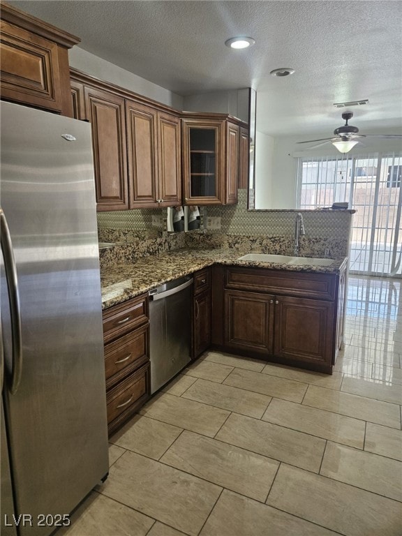 Kitchen featuring appliances with stainless steel