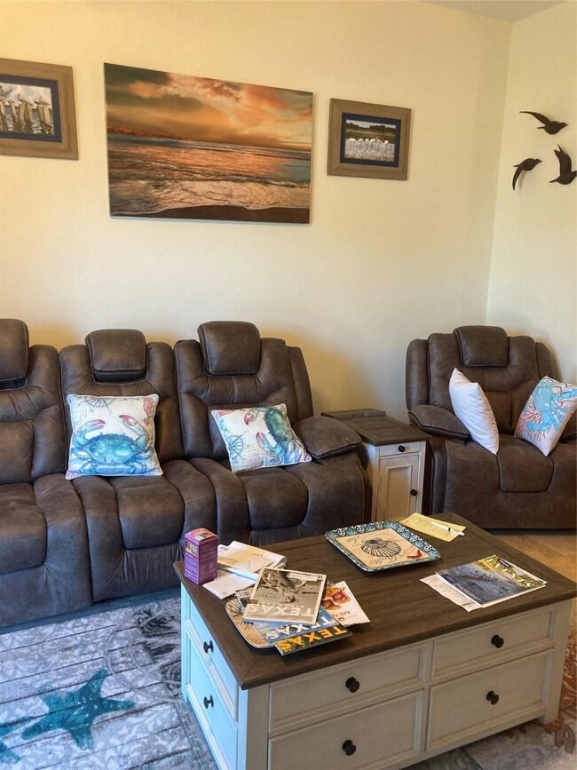 Reclining sofa and chair with fold up coffee table