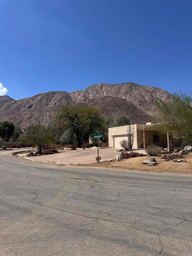 Front exterior with yard on 0.39 acre lot