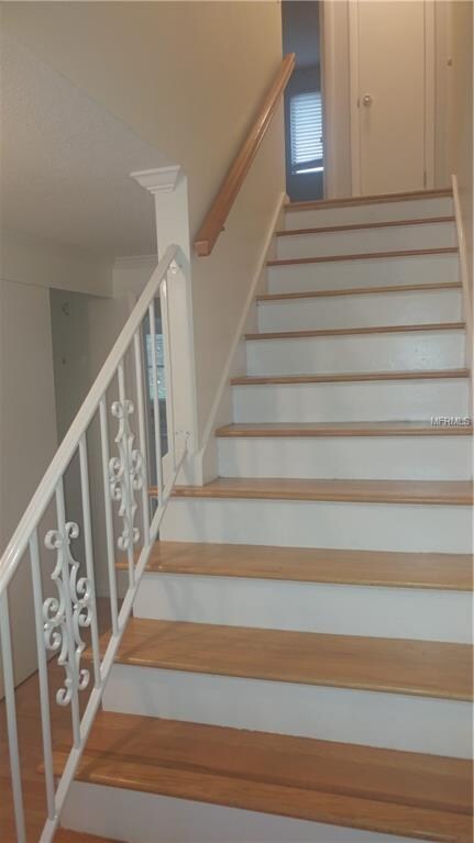 Hardwood Oak steps leading to second floor bedroom