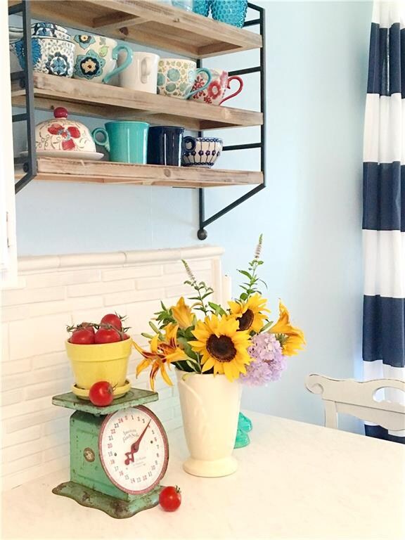 Farmhouse style reclaimed wood and metal shelving 