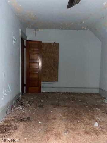 Bonus room featuring vaulted ceiling