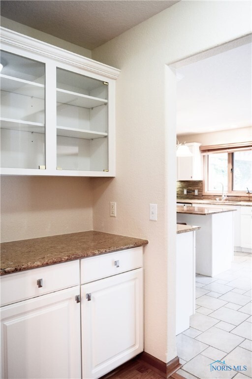 Butler's pantry between dining room and kitchen