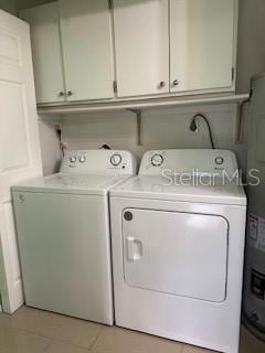 Washer/Dryer (inside primary bathroom)