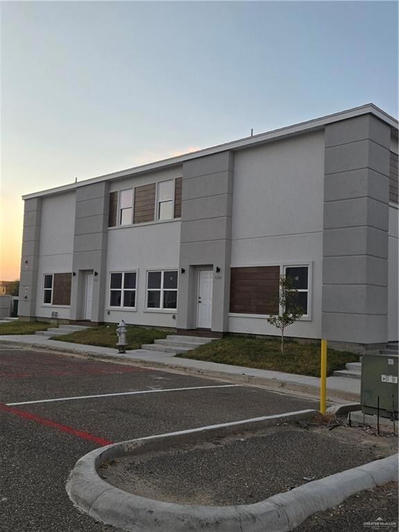 View of outdoor building at dusk