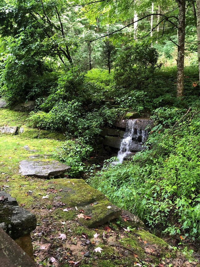 Waterfall at entrance to Reserve at Timberwoods