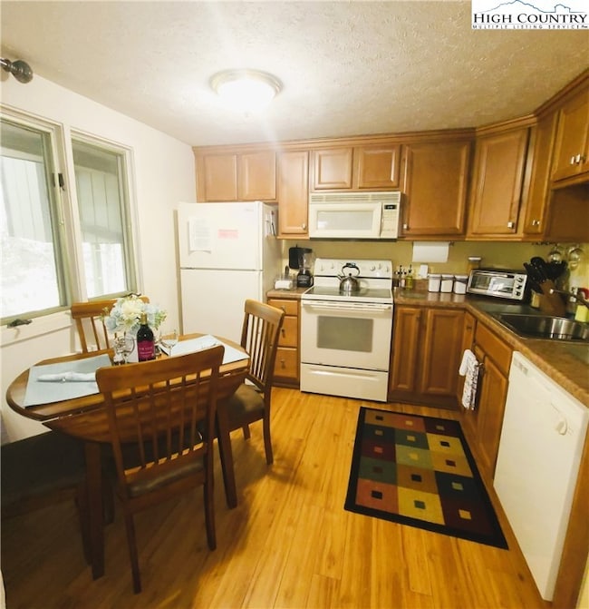 Kitchen/Dining view from Living Room.  Open Floor