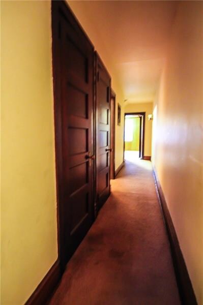 Upstairs boasts lots of storage space behind origi
