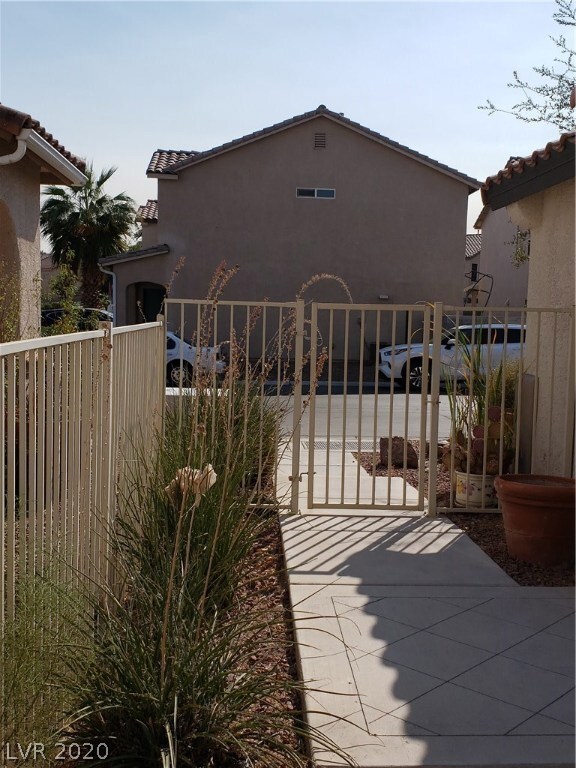 Gated entry to front door and patio