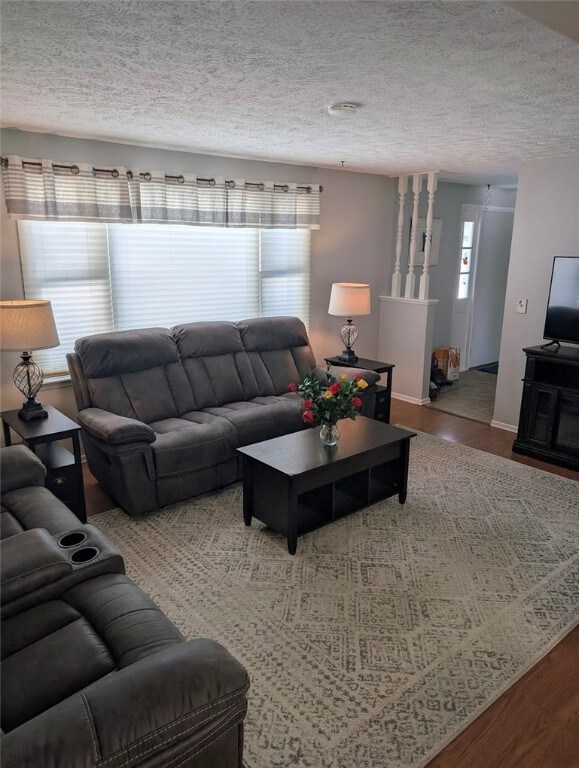 The livingroom is bright with natural light...