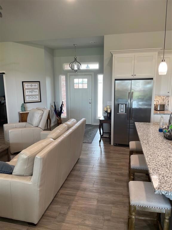 Living room featuring wood-type flooring
