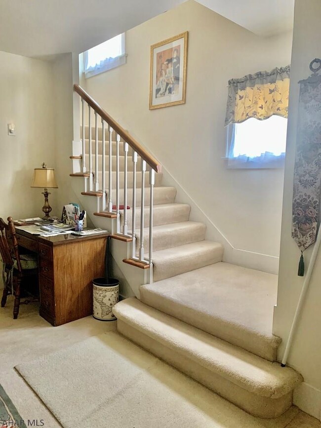 view from entrance w/ wide stairs