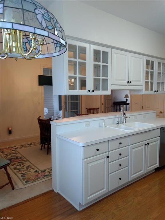 Kitchen with pass through cabinets