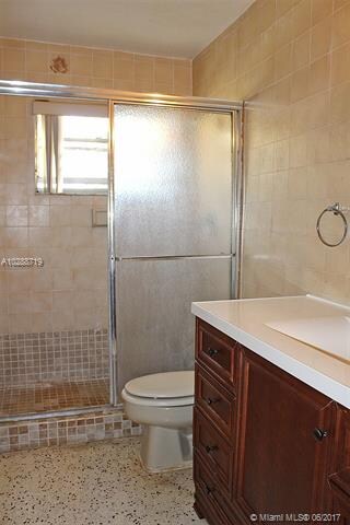 Hall bathroom with new vanity and sink.