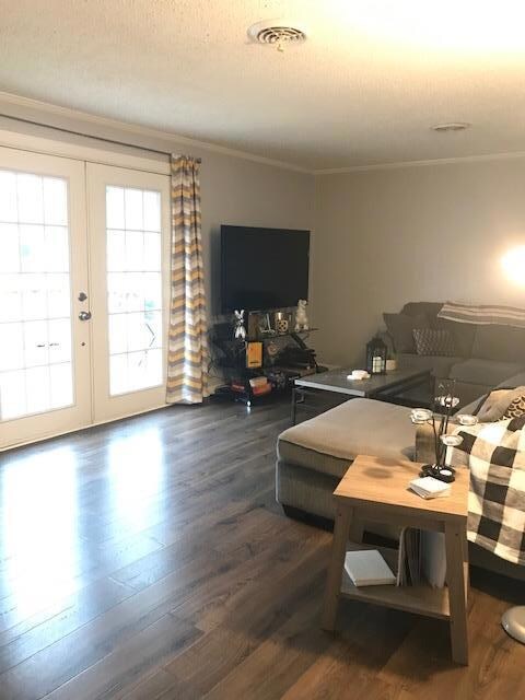 Large 12x20 Living Room with beautiful floors and double patio doors!!