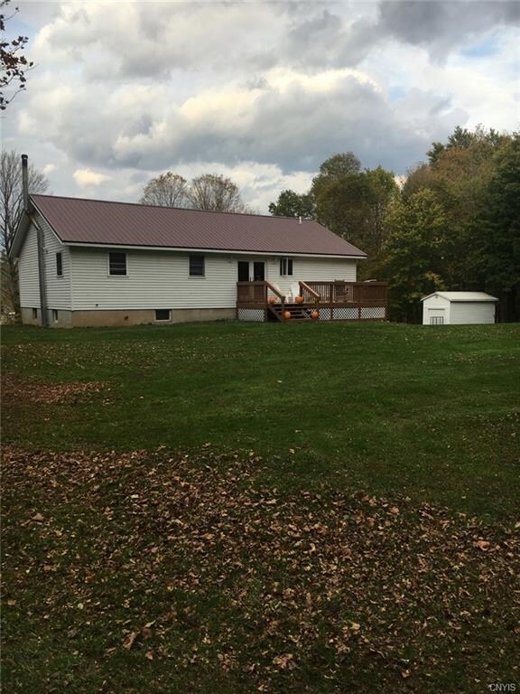 Back of House nice yard and deck