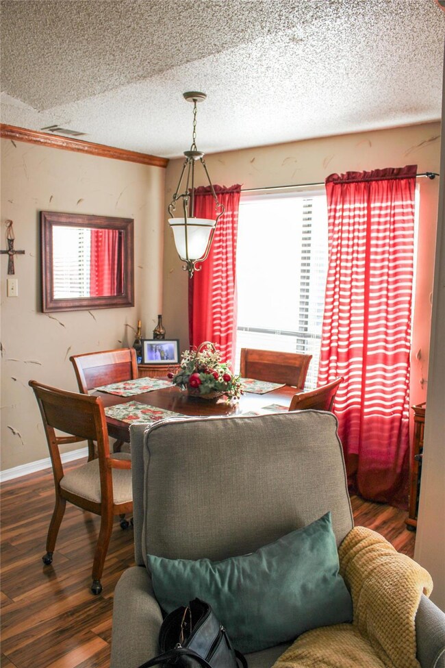 Dining room with wood flooring