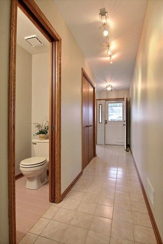 Ceramic Foyer and Double Deep Closet, Guest Powder