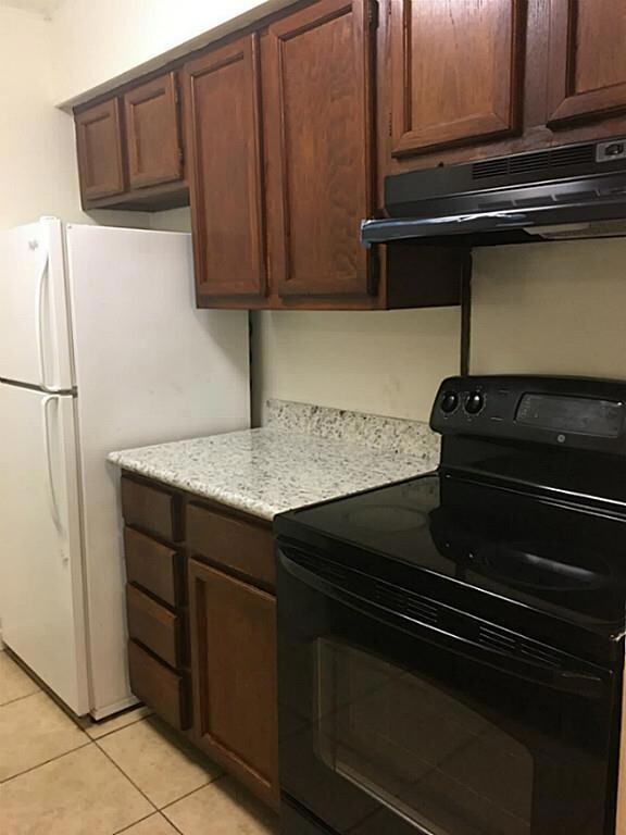 Refrigerator included, plenty of cabinets for storage