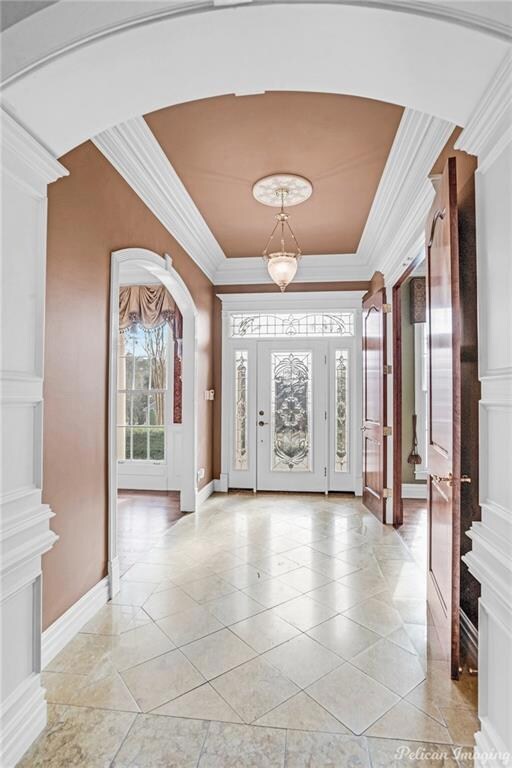 View of the foyer from the living room.  The forma