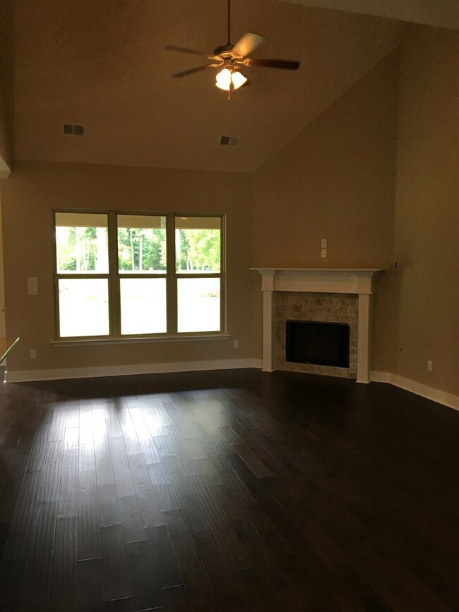 2 story Great room with corner gas fireplace open 