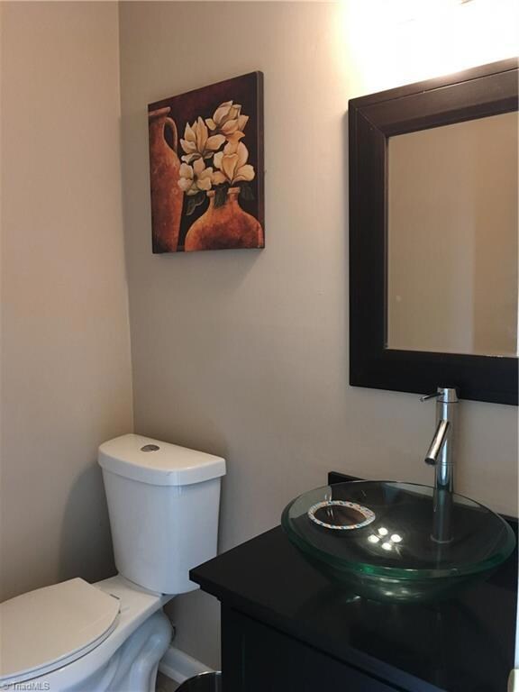 Half bath downstairs with vessel sink