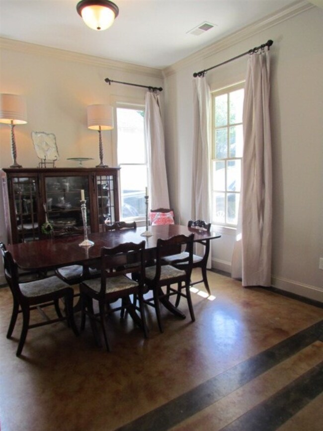 The formal living room is light-filled - currently