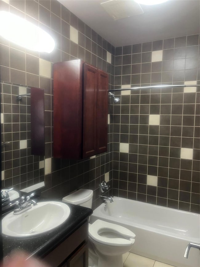 Full bathroom with tile patterned floors, shower /