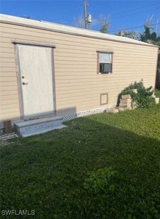View of property exterior with cooling unit and a