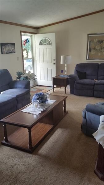 Living room and entry door from the front porch