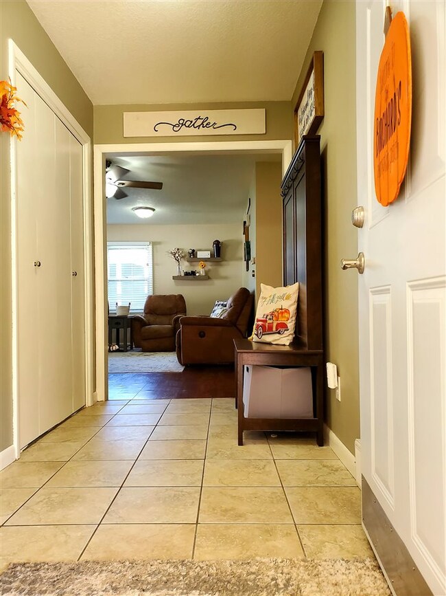 Spacious front entry with coat closets.