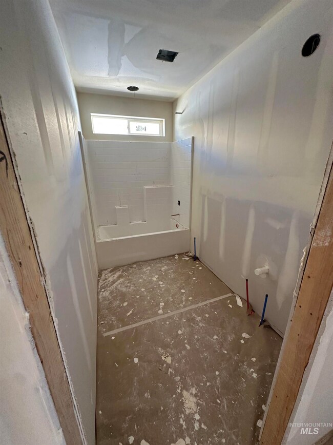 Full bath featuring bathing tub / shower combination
