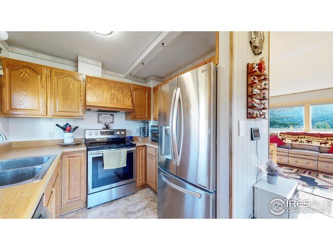 tiled kitchen with stainless appliances