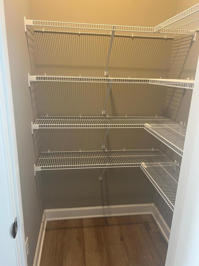 An abundance of storage located in the kitchen! Actual interior of the home!